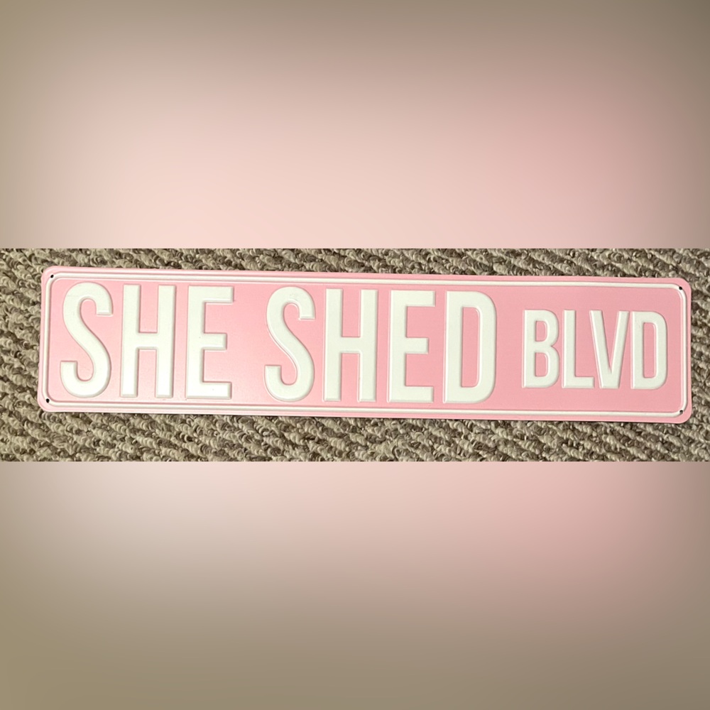 Pink and White Decorative Sign